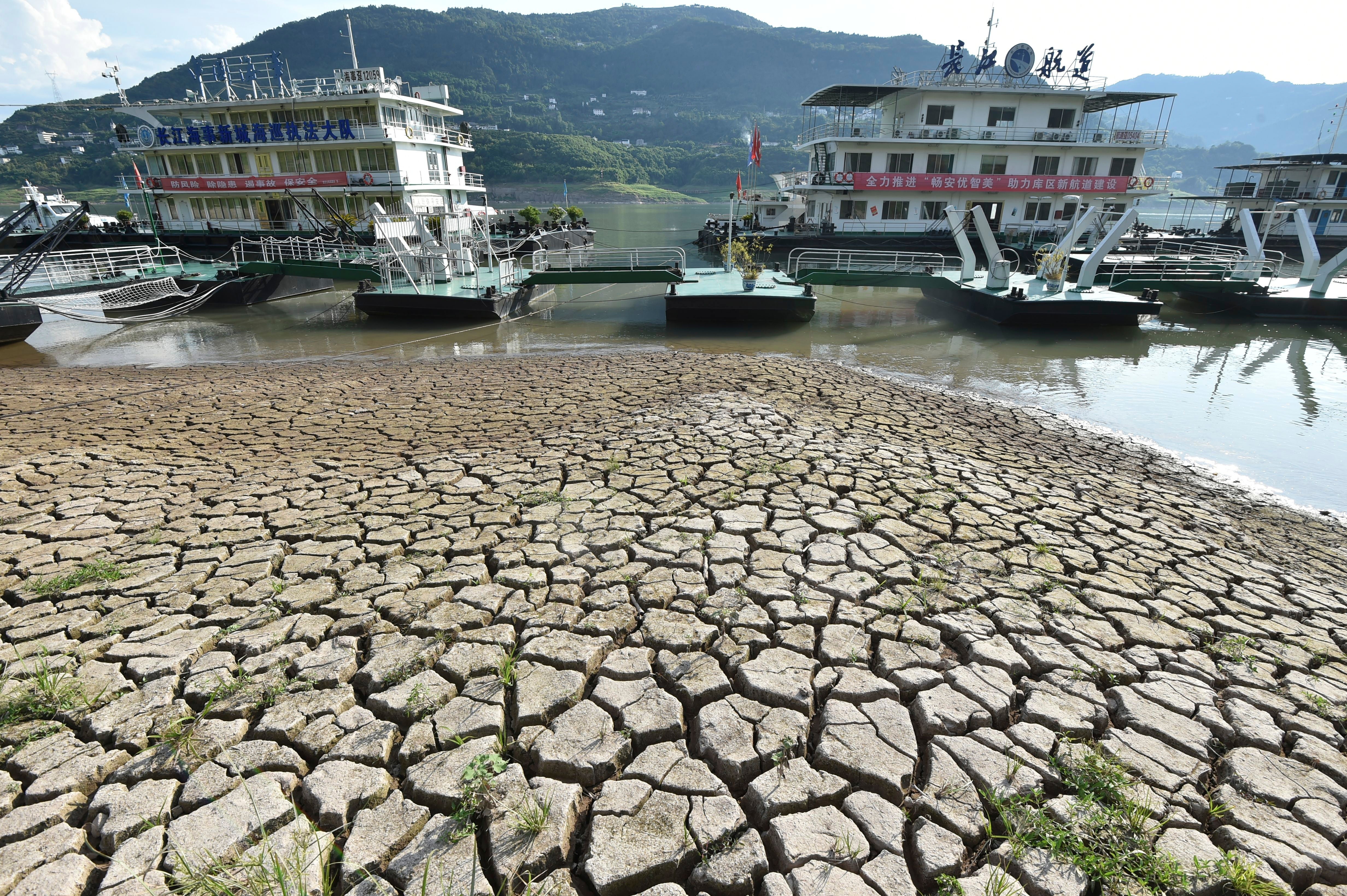 Boats on the dried-out riverbed on the Yangtze near Chongqing on August 16. (Photo: Chinatopix, AP)