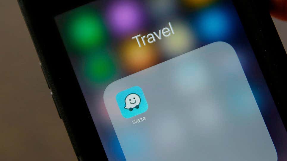 Waze is shutting down its carpooling app in September, citing low usage.  (Image: Eric Risberg, AP)