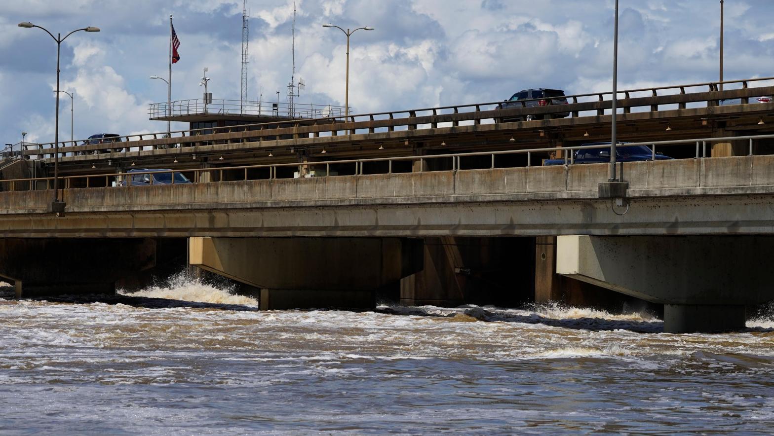 The Ross Barnett Reservoir spillway is releasing a controlled amount of flood water into the Pearl River (Image: Rogelio V. Solis, AP)