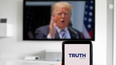 Trump Is Actively Platforming Dozens of Insane QAnon Accounts on Truth Social