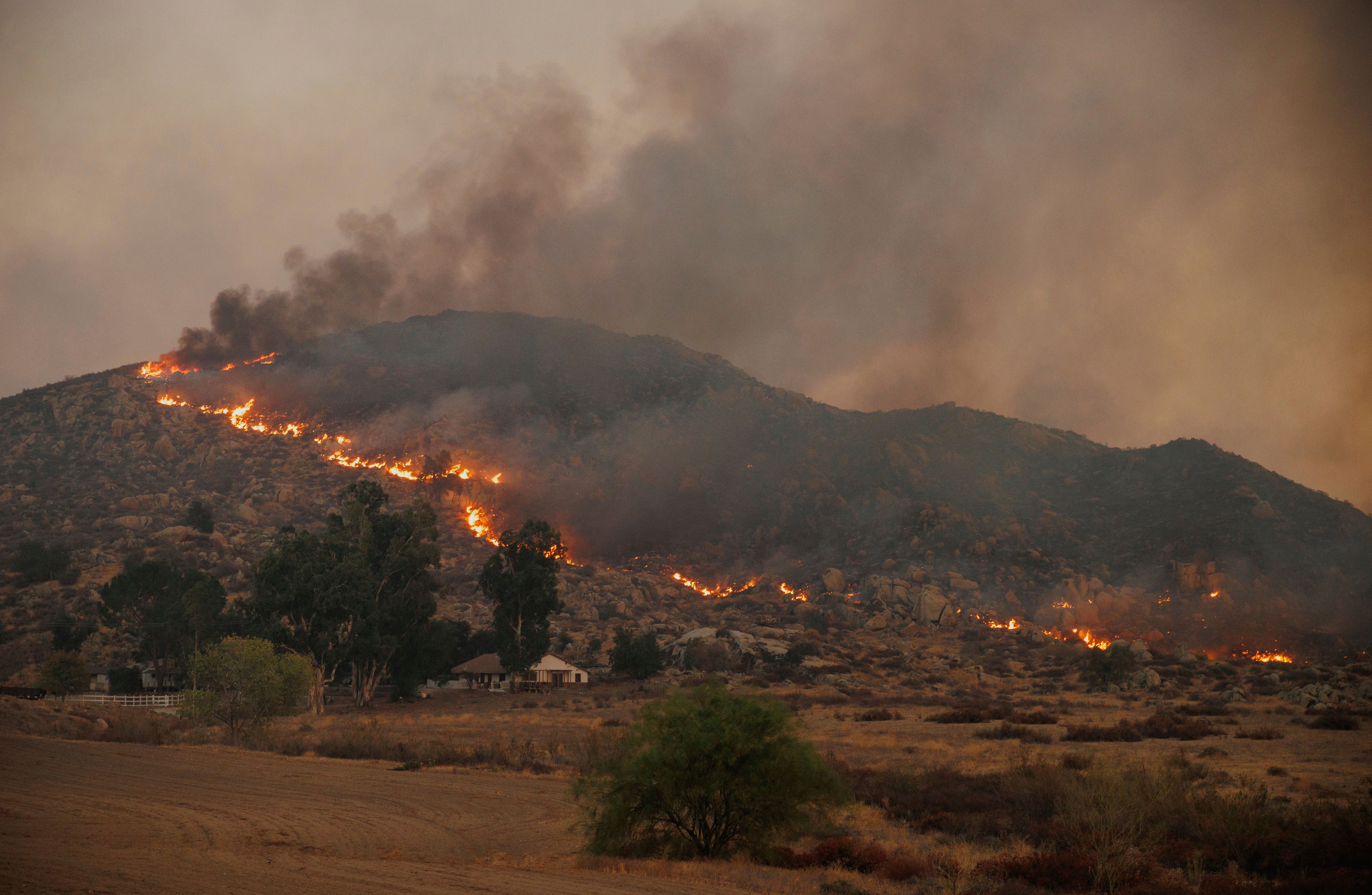 A hillside burns in the Fairview Fire Monday, Sept. 5, 2022, near Hemet, California.  (Photo: Ethan Swope, AP)