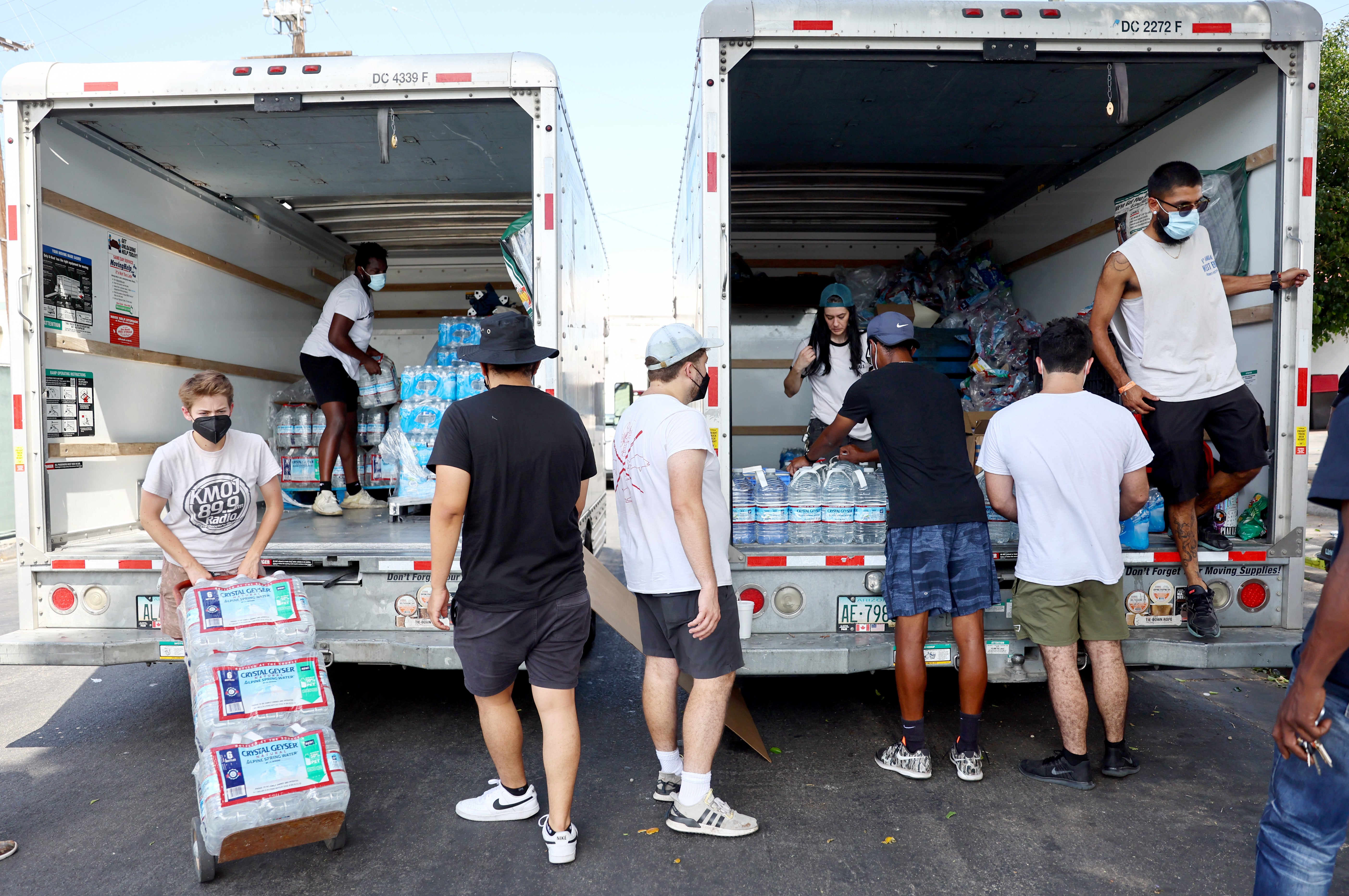 Volunteers with Water Drop LA prepare to deliver water and other items to members of the Skid Row community on September 4, 2022 in Los Angeles, California. (Photo: Mario Tama, Getty Images)