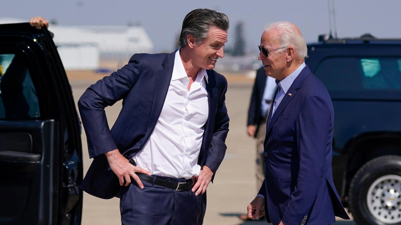 President Joe Biden talks with California Gov. Gavin Newsom as he arrives at Mather Airport on Air Force One Monday, Sept. 13, 2021. (Photo: Evan Vucci, AP)