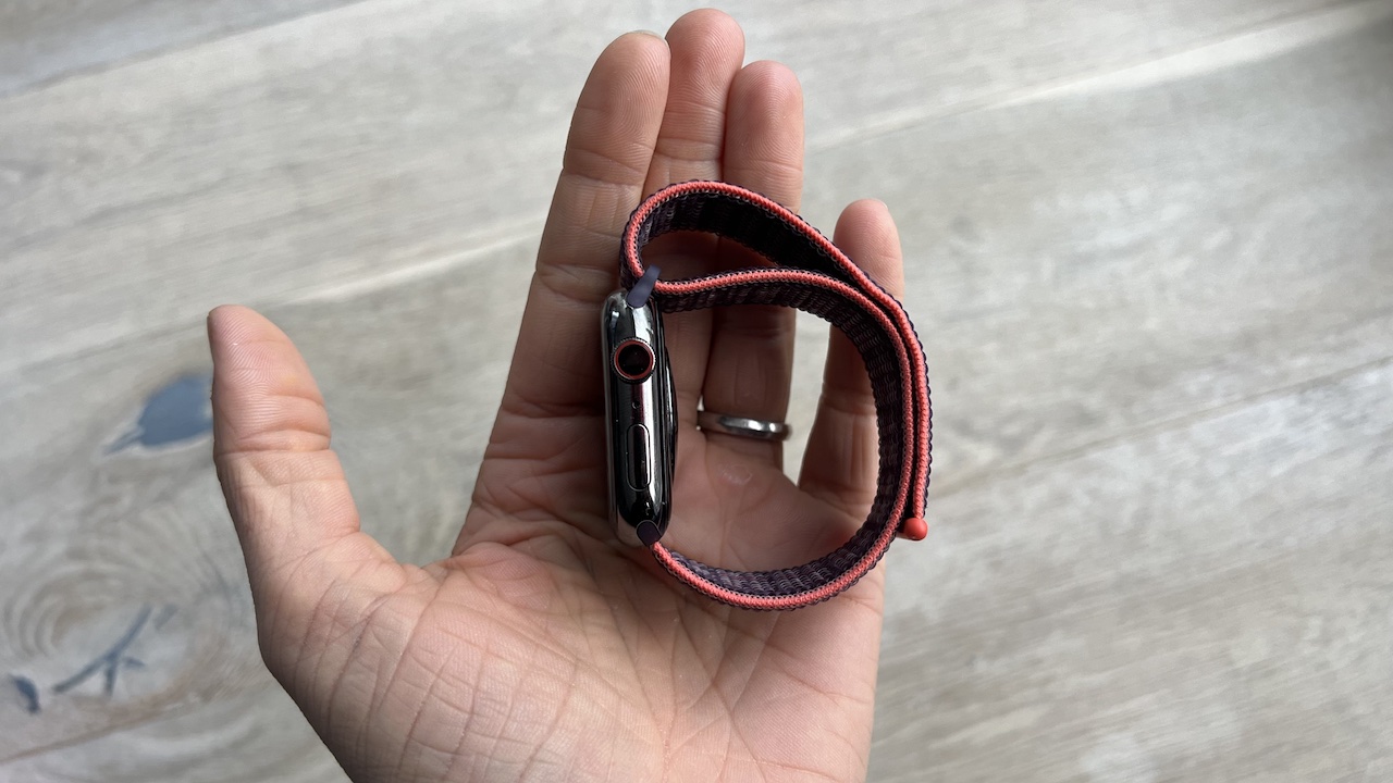 The side of the Apple Watch Series 8 in graphite stainless steel