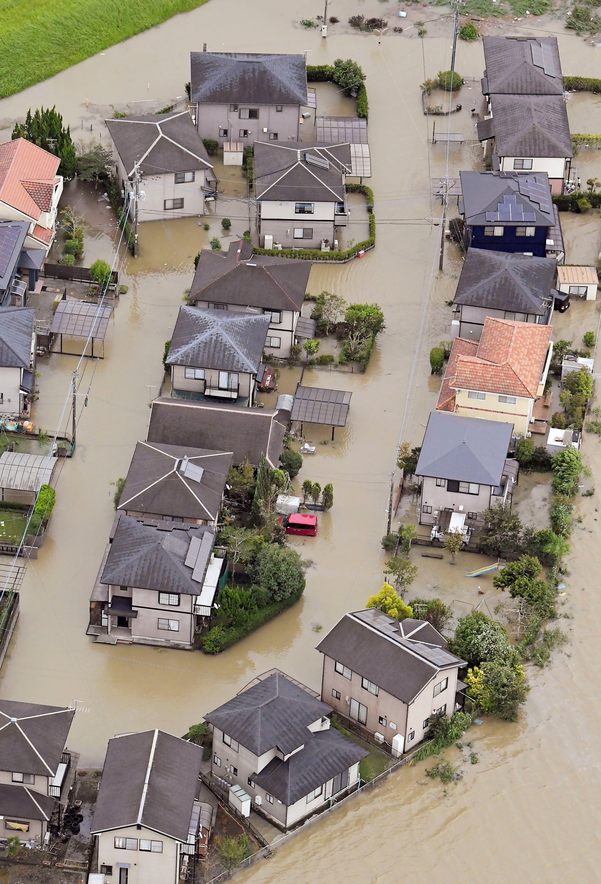 Flooded homes in Kunitomi in Miyazaki Prefecture on September 19. (Photo: Kyodo, AP)