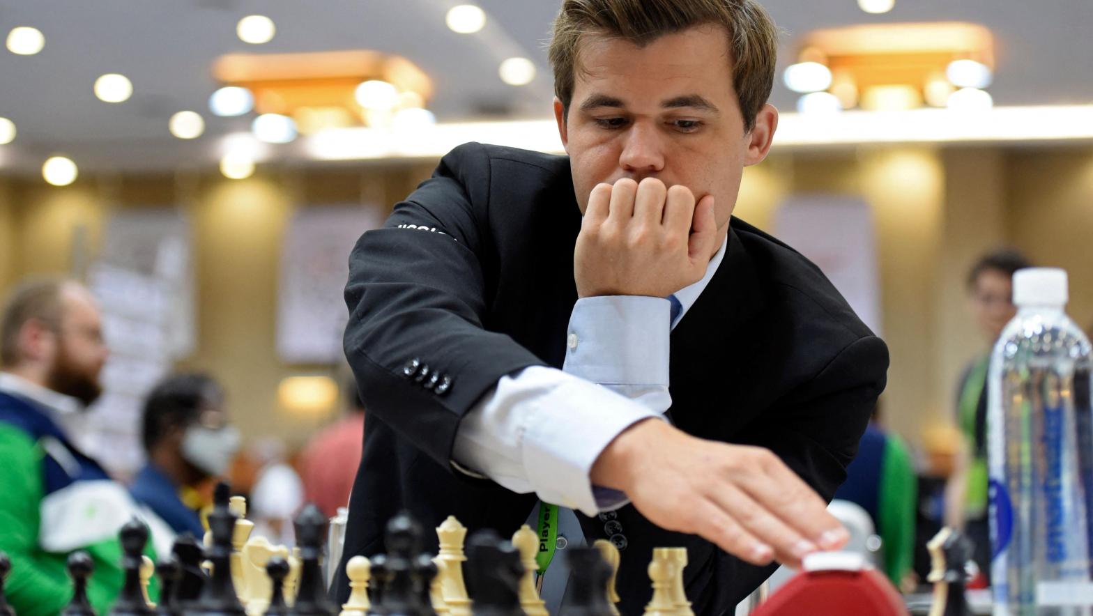Grandmaster Magnus Carlsen keeps making underhanded remarks to imply rival Hans Niemann is cheating in his games. (Photo: ARUN SANKAR/AFP, Getty Images)