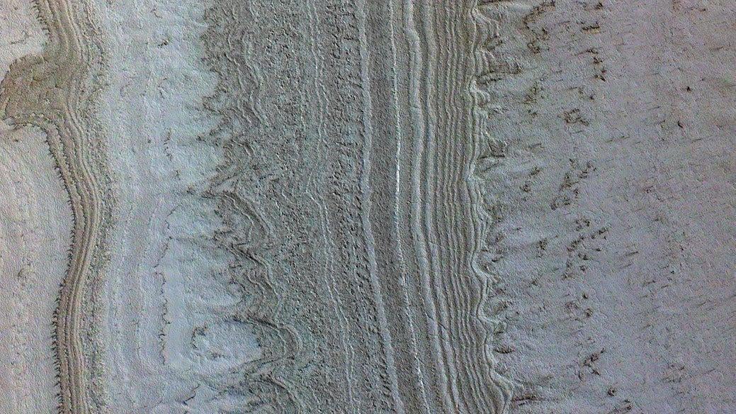 This image taken by NASA's Mars Reconnaissance Orbiter shows ice sheets at Mars' south pole.  (Image: NASA/JPL-Caltech/University of Arizona/JHU)