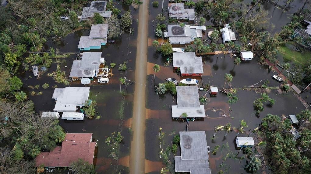 In this aerial view, flooded homes are shown after Hurricane Ian moved through the Gulf Coast of Florida on September 29, 2022 in Port Charlotte, Florida. (Photo: Win McNamee, Getty Images)