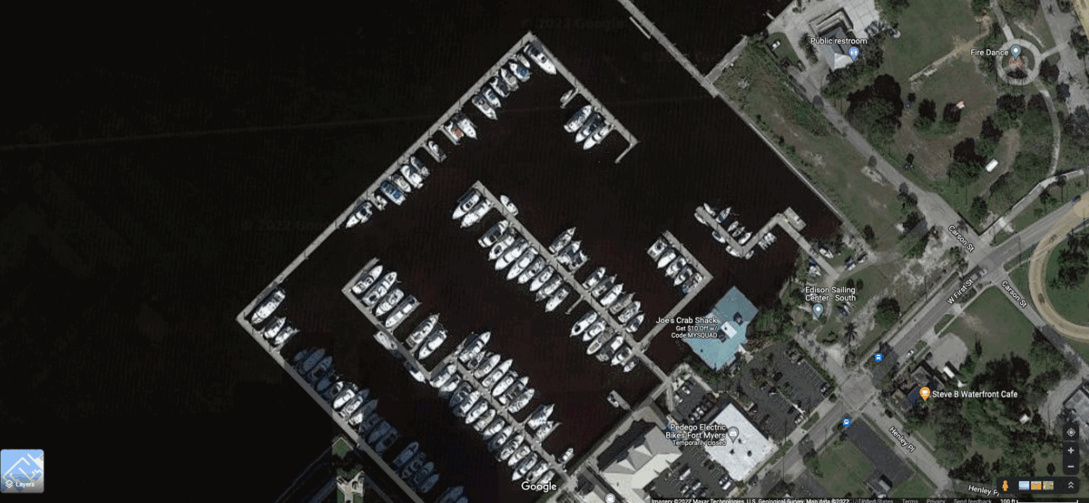 The hurricane left Legacy Harbour Marina in Fort Myers in complete dissaray. (Gif: Gizmodo / NOAA / Google Maps)