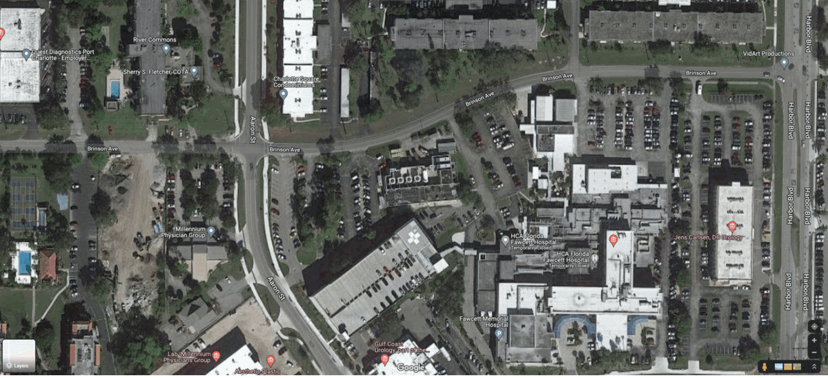 The storm caused significant damage to HCA Florida Fawcett Hospital in Port Charlotte, tearing away a portion of the roof. (Gif: Gizmodo / NOAA / Google Maps)