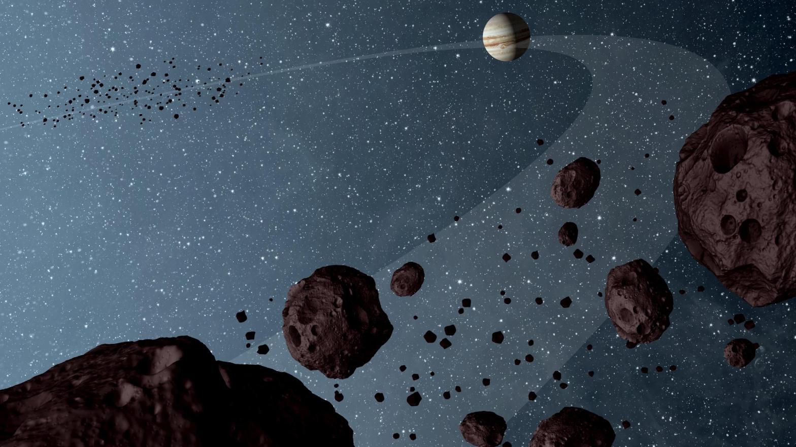 An illustration of the Trojan asteroids as they lead and follow Jupiter. (Illustration: NASA)