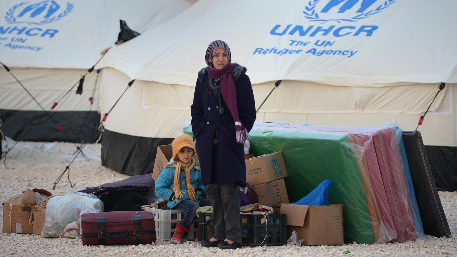 Newly arrived refugees from Syria wait for tents to go up at the Za'atari refugee camp on January 30, 2013 in Mafraq, Jordan. (Photo: Jeff J Mitchell, Getty Images)