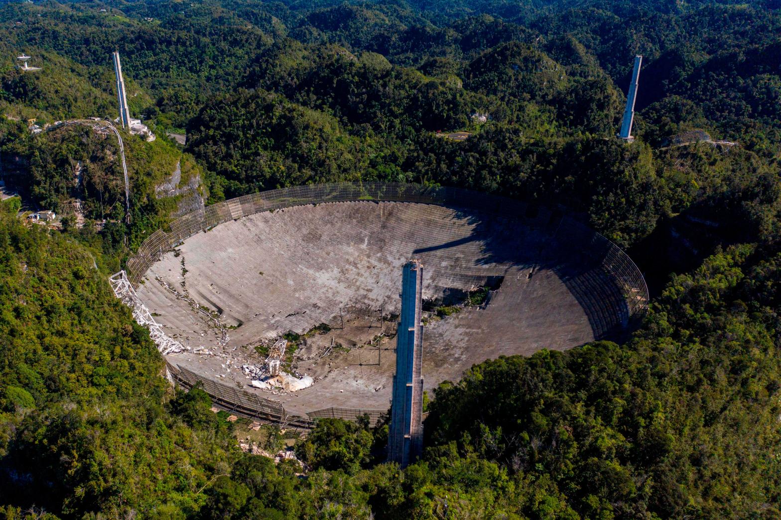 The destroyed Arecibo Observatory dish. (Photo: Ricardo ARDUENGO / AFP, Getty Images)