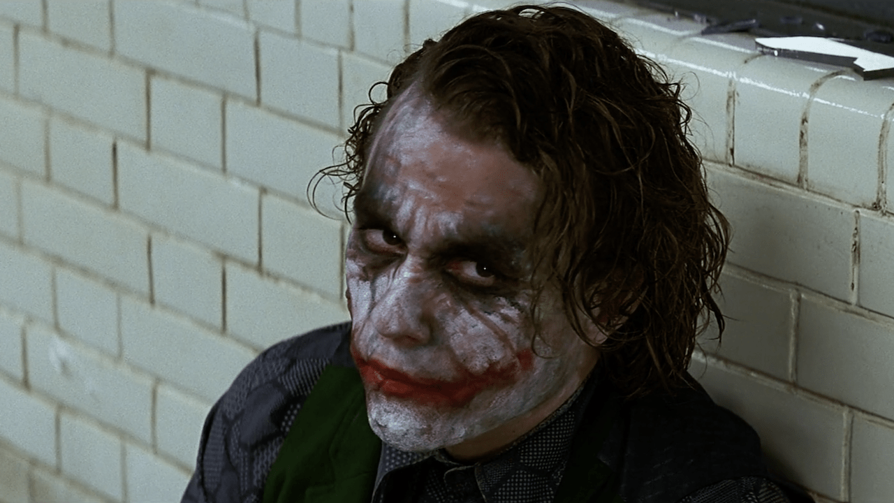 Actor Heath Ledger as the Joker in the 2008 Batman film The Dark Knight, directed by Christopher Nolan. (Screenshot: Warner Bros.)