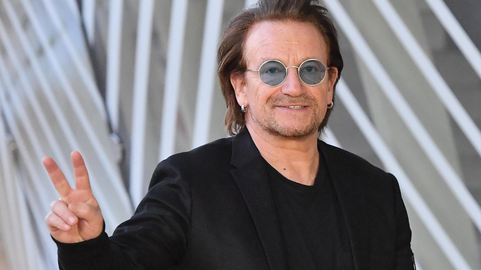Bono suggested the idea of giving away the album for free in 2014 to Tim Cook. (Image: Emmanuel Dunand, Getty Images)
