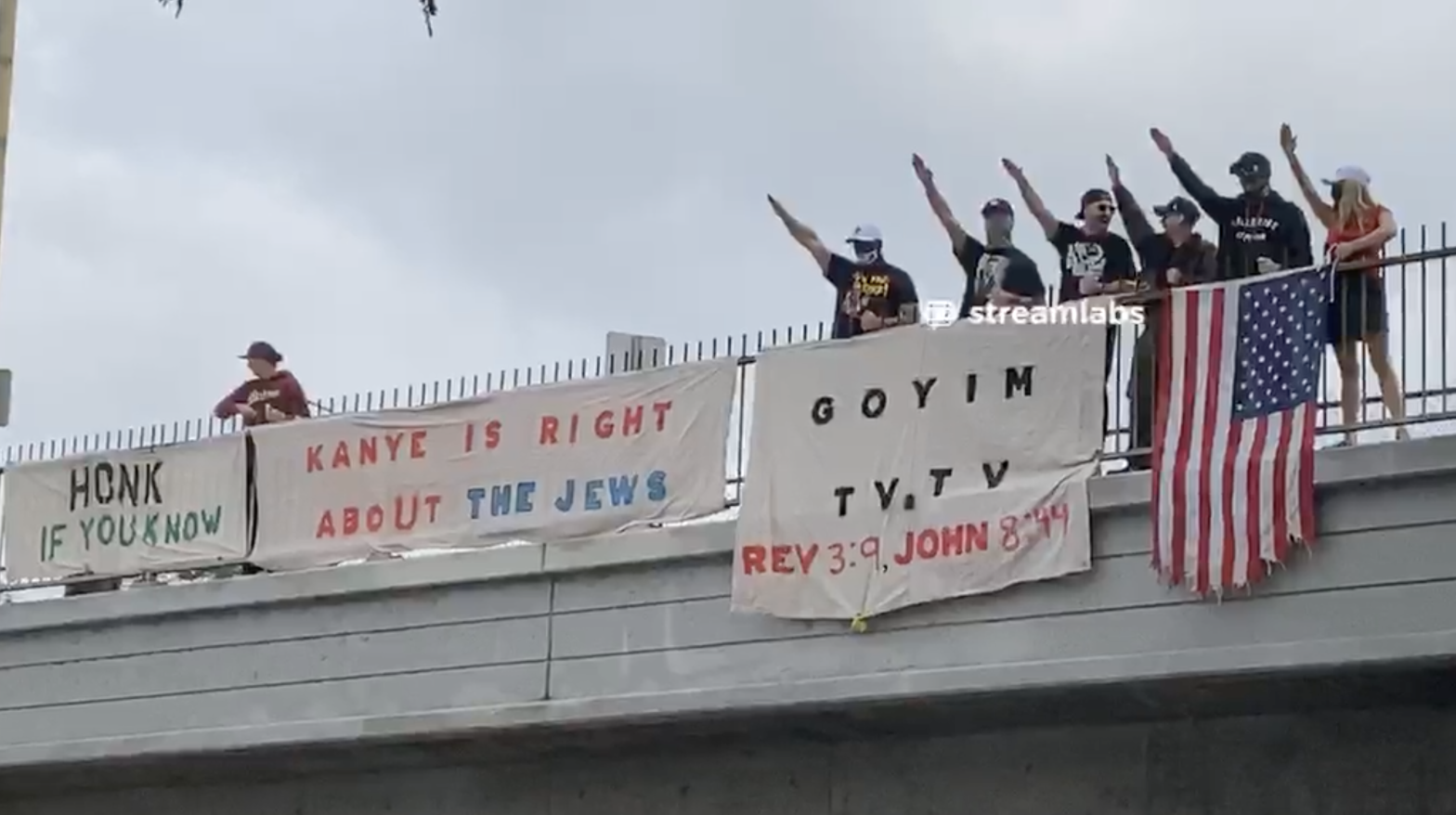 The antisemitic Goyim Defence League hung a banner over a busy highway in Los Angeles citing Kanye West's hateful comments about Jews. (Screenshot: Jody Serrano / Gizmodo / GoyimTV)