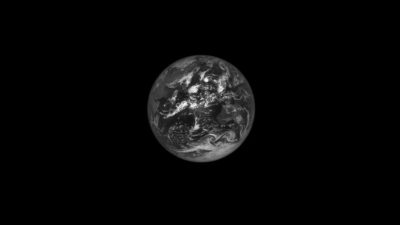 NASA’s Asteroid Probe Captures Haunting Images of the Earth and Moon