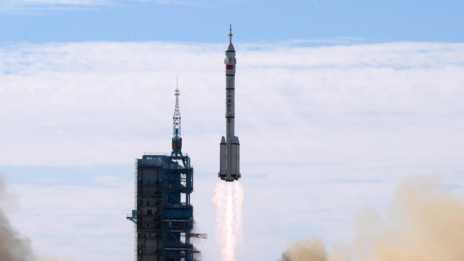 A Long March-2F Y12 rocket blasting off in June 2021.  (Photo: Ng Han Guan, AP)