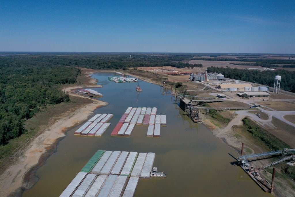 In this aerial view, barges, stranded by low water sit at the Port of Rosedale along the Mississippi River on October 20, 2022 in Rosedale, Mississippi. (Photo: Scott Olson, Getty Images)