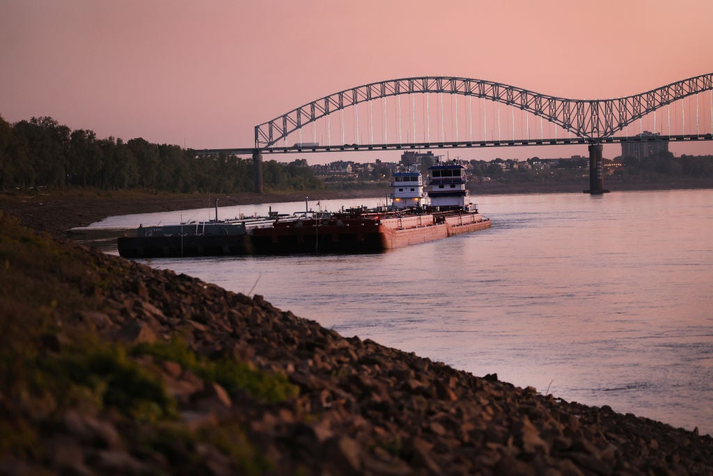 A tug holds barges along the rocky shoreline of the Mississippi River on October 18, 2022 in Memphis, Tennessee. (Photo: Scott Olson, Getty Images)