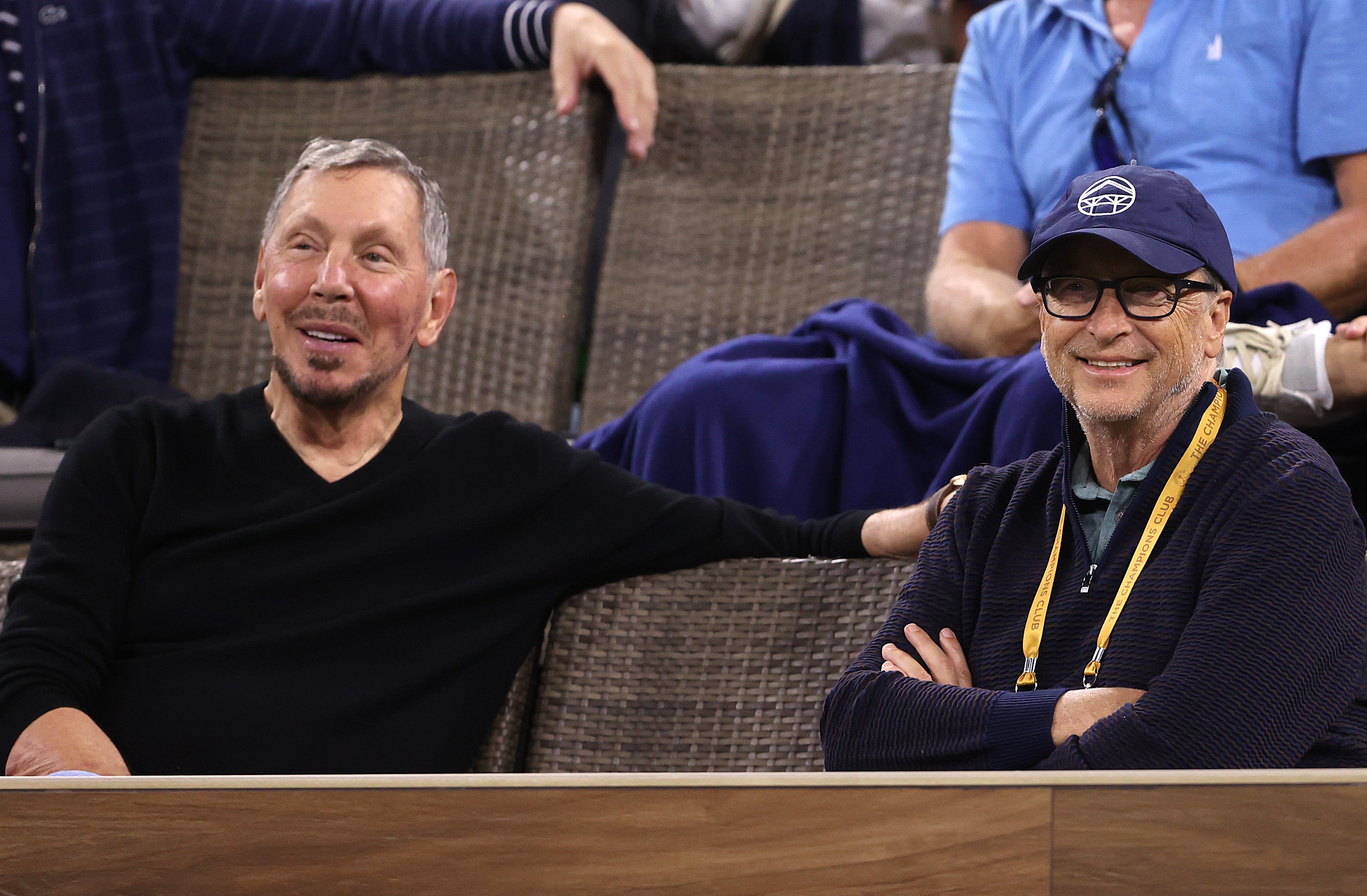Larry Ellison, the founder of Oracle, sits beside his fellow billionaire Bill Gates. (Photo: Sean M. Haffey, Getty Images)