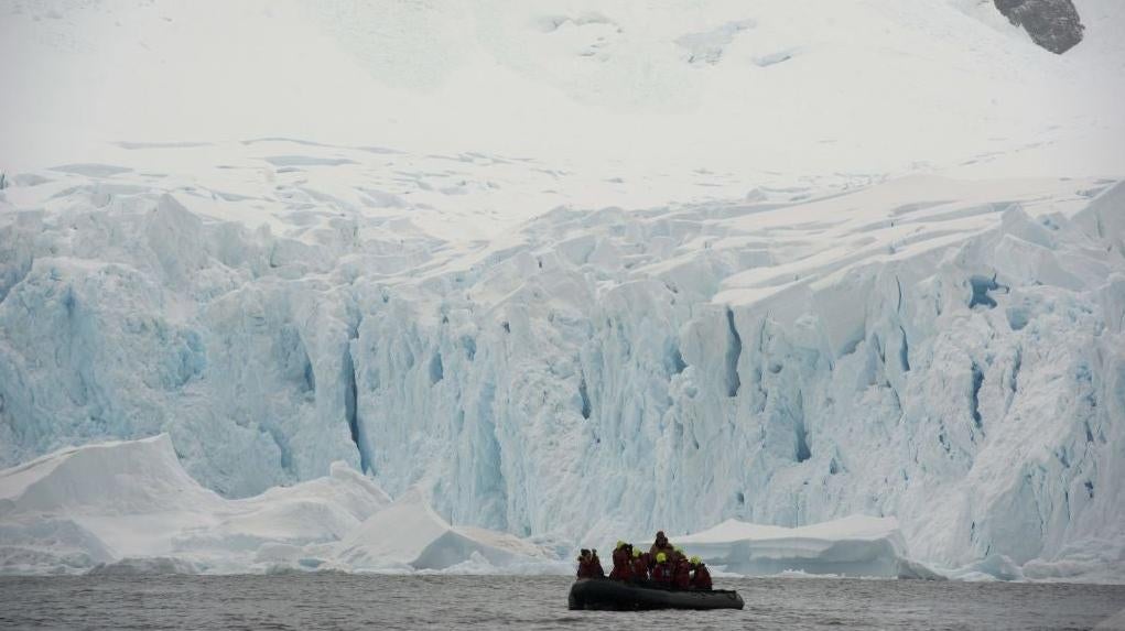 Tourists cruise the western Antarctic peninsula on March 04, 2016. The Antarctic tourism industry is generally considered to have begun in the late 1950s when Chile and Argentina took more than 500 fare-paying passengers to the South Shetland Islands aboard a naval transportation ship. (Photo: EITAN ABRAMOVICH/AFP, Getty Images)