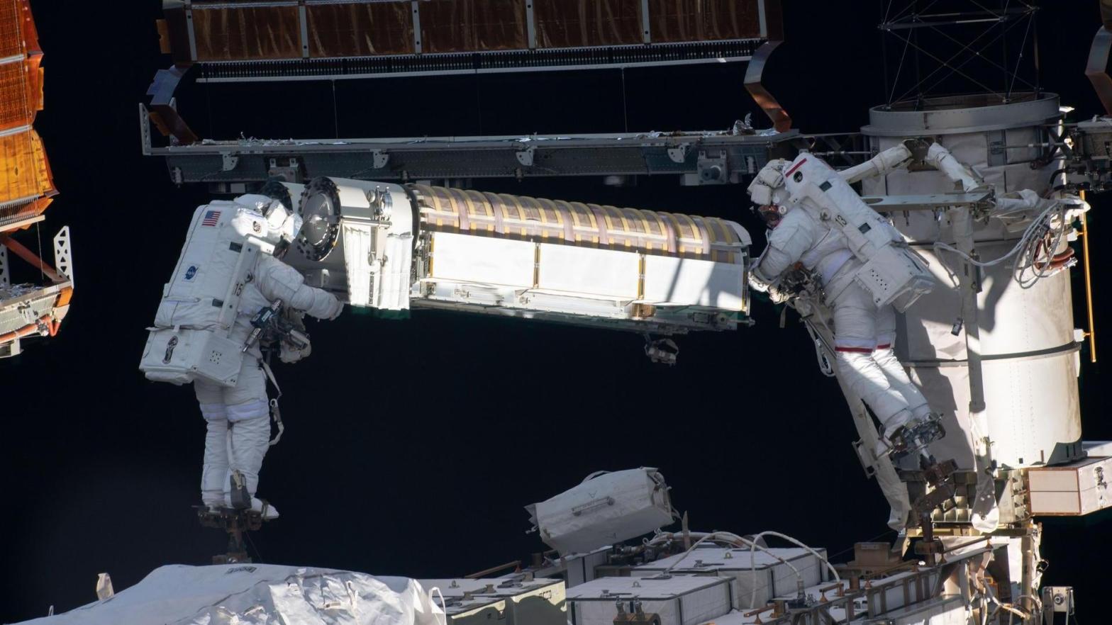 NASA astronaut Shane Kimbrough (left) and ESA astronaut Thomas Pesquet (right) during a spacewalk on June 16, 2021 to install new solar arrays. (Image: NASA)