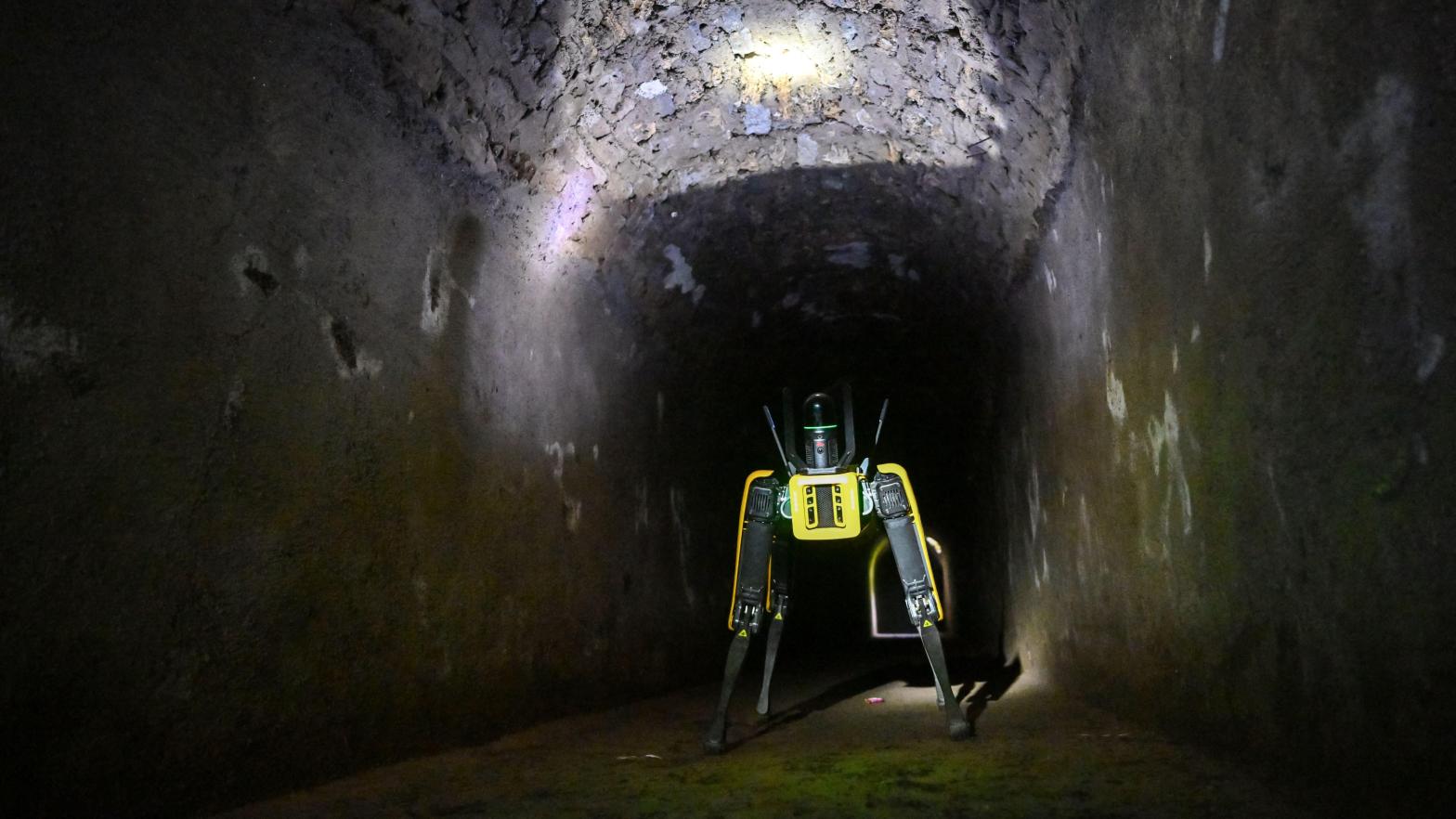 Boston Dynamics' Spot menacingly inspecting a tunnel in Pompeii this summer.  (Image: Andreas Solaro, Getty Images)