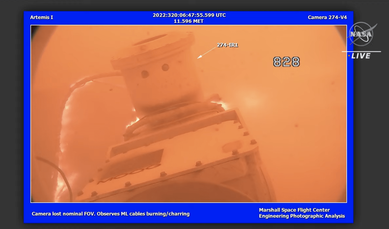 Pad camera aflame as SLS blasted off.  (Screenshot: NASA TV)