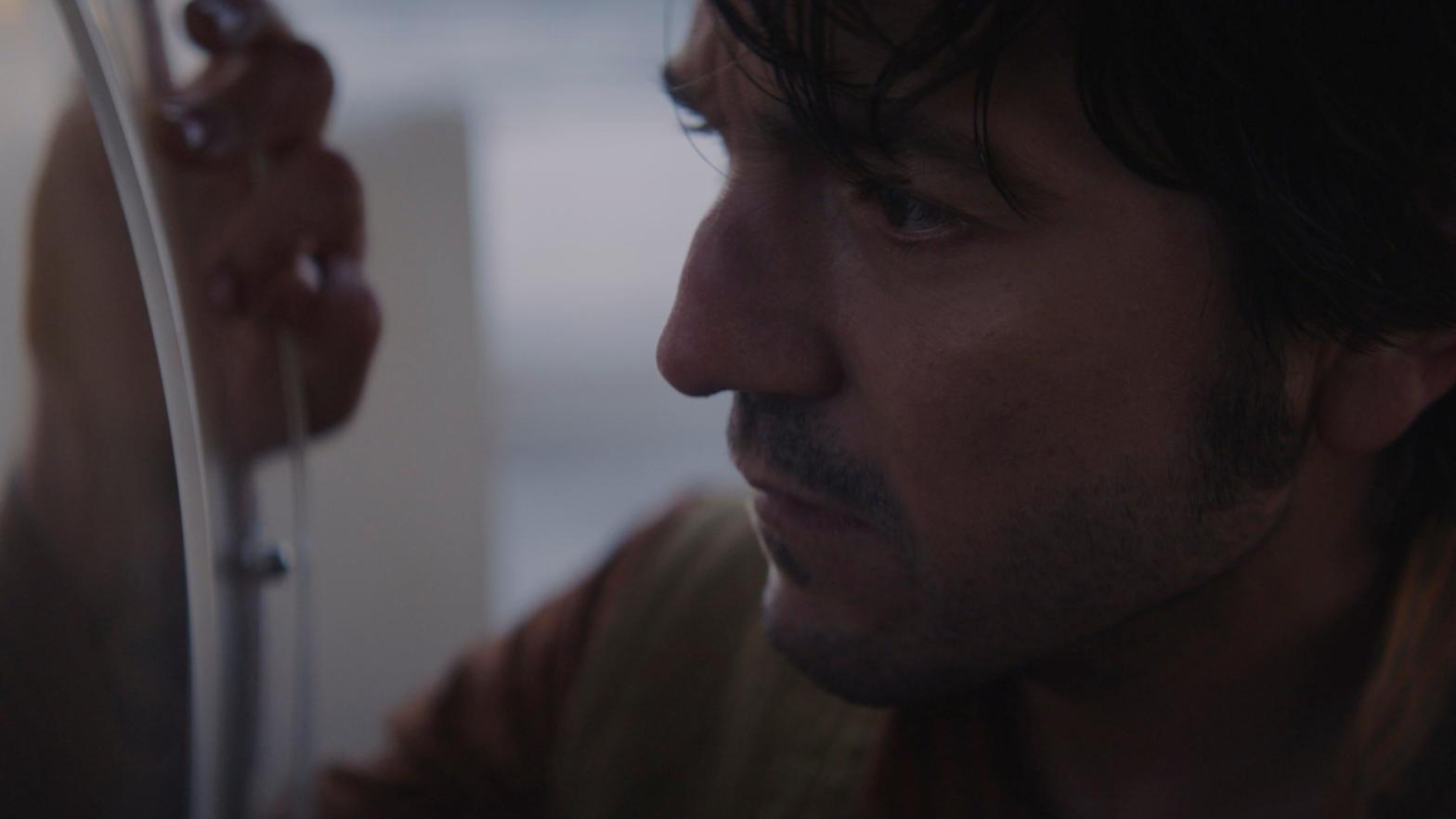 Andor (Diego Luna) looks toward his future.  (Image: Lucasfilm)