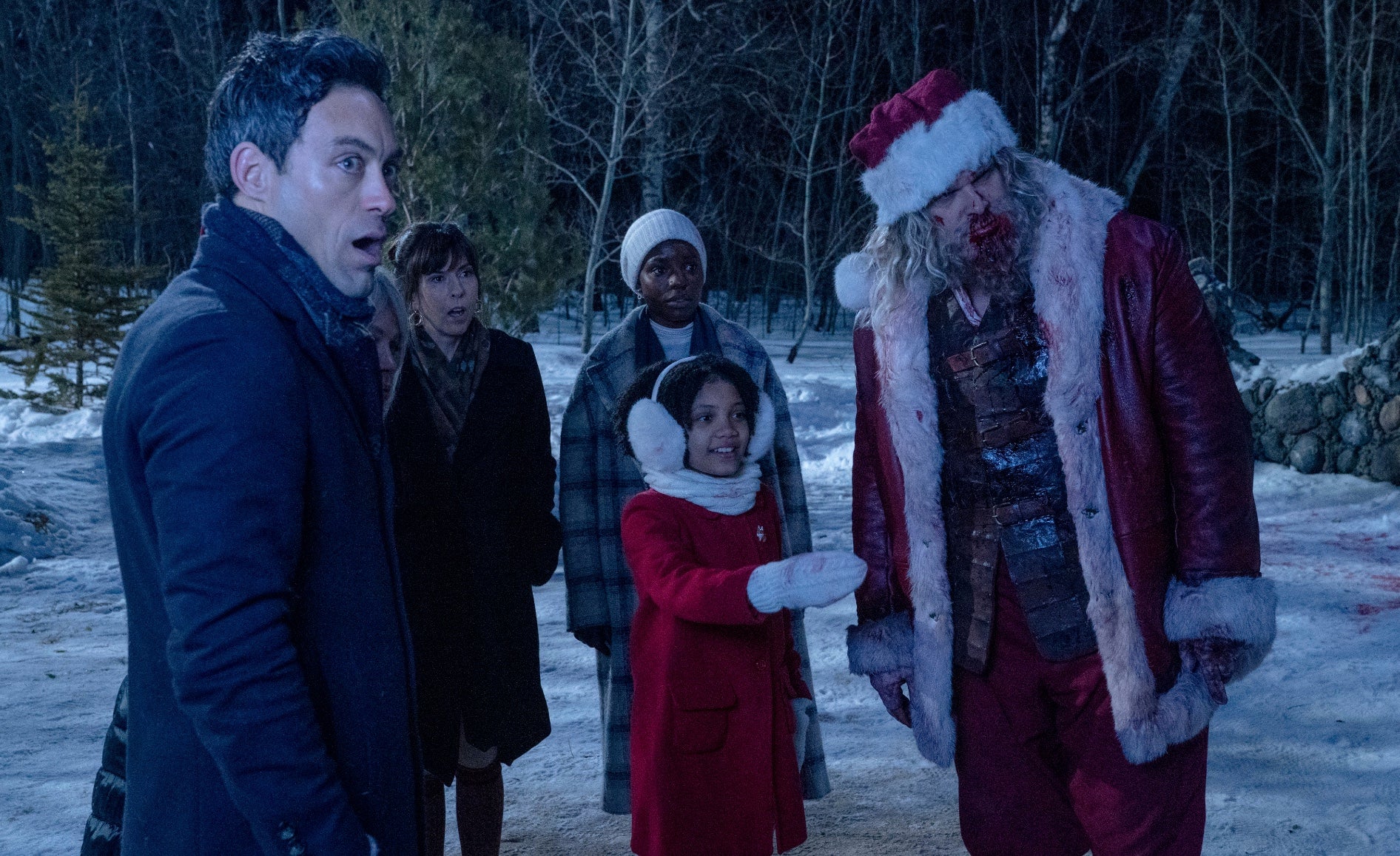 Santa and the family. (Image: Universal Pictures)