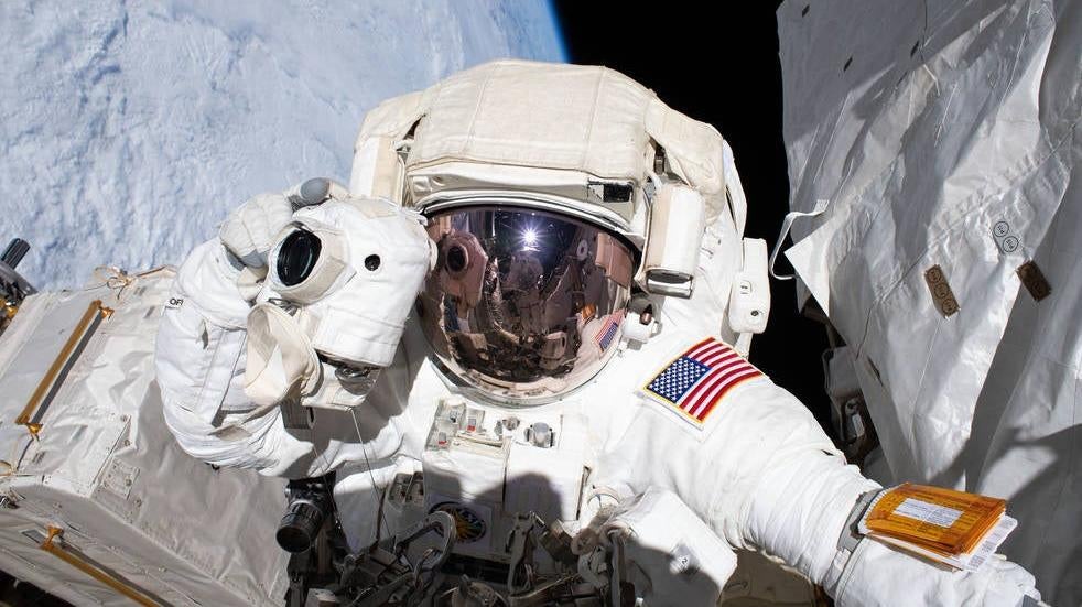 NASA astronaut Andrew Morgan snapping a photograph while conducting a spacewalk outside the International Space Station in November 2019. (Photo: NASA)