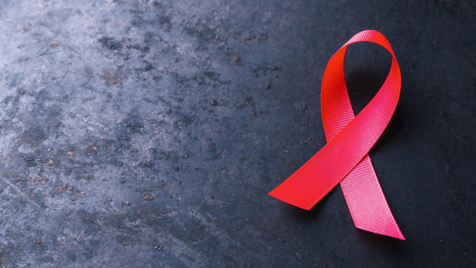 Above, a red AIDS awareness ribbon. (Image: Shutterstock, Shutterstock)
