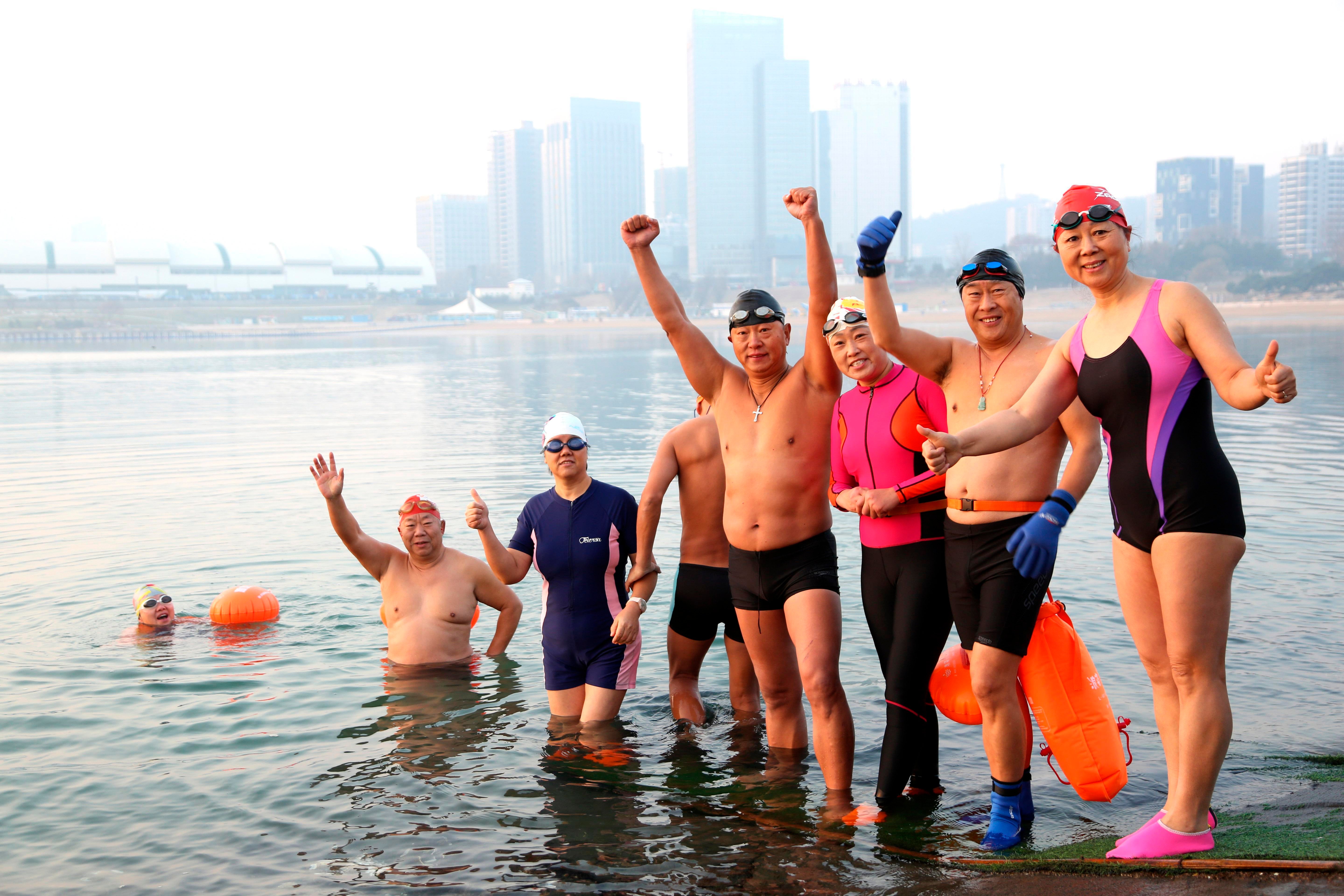 Winter swimming enthusiasts took part in the winter swimming activity at  the winter swimming base in Lianyungang City, east China's Jiangsu  Province, December 7, 2022. (Photo: Imaginechina, AP)