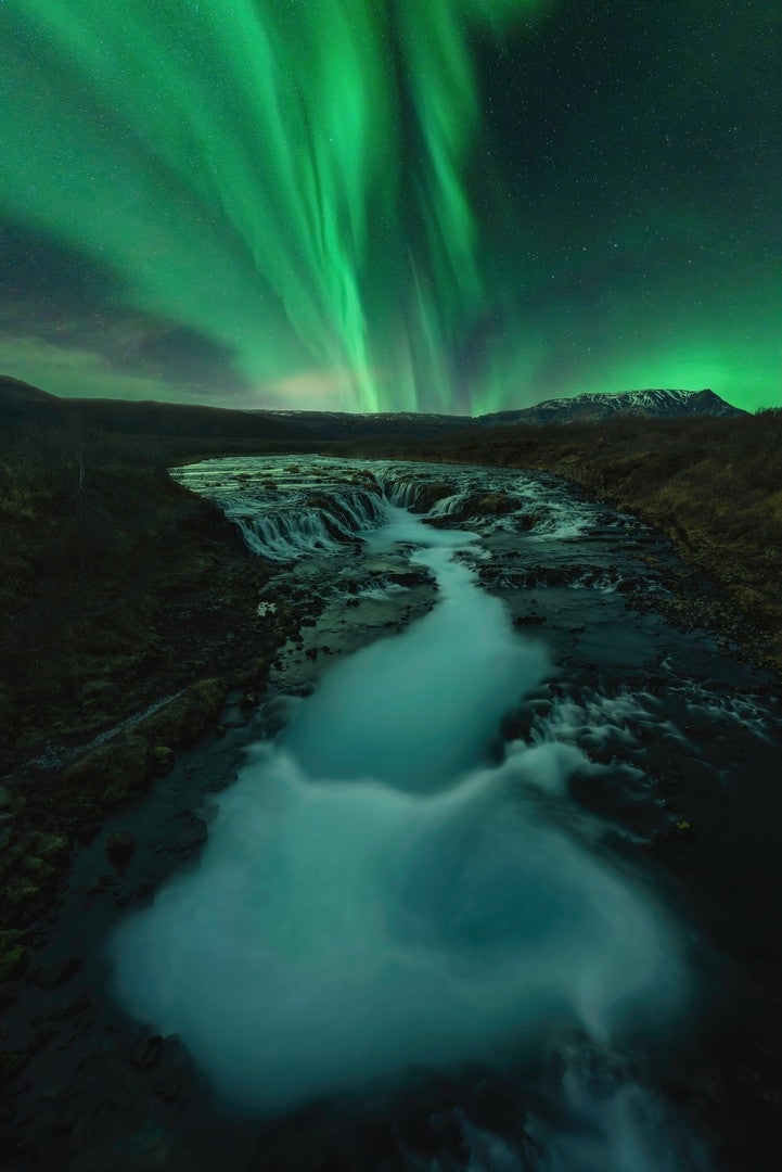 The Northern lights and flowing water in Brúarfoss, Iceland. (Photo: Jabi Sanz)