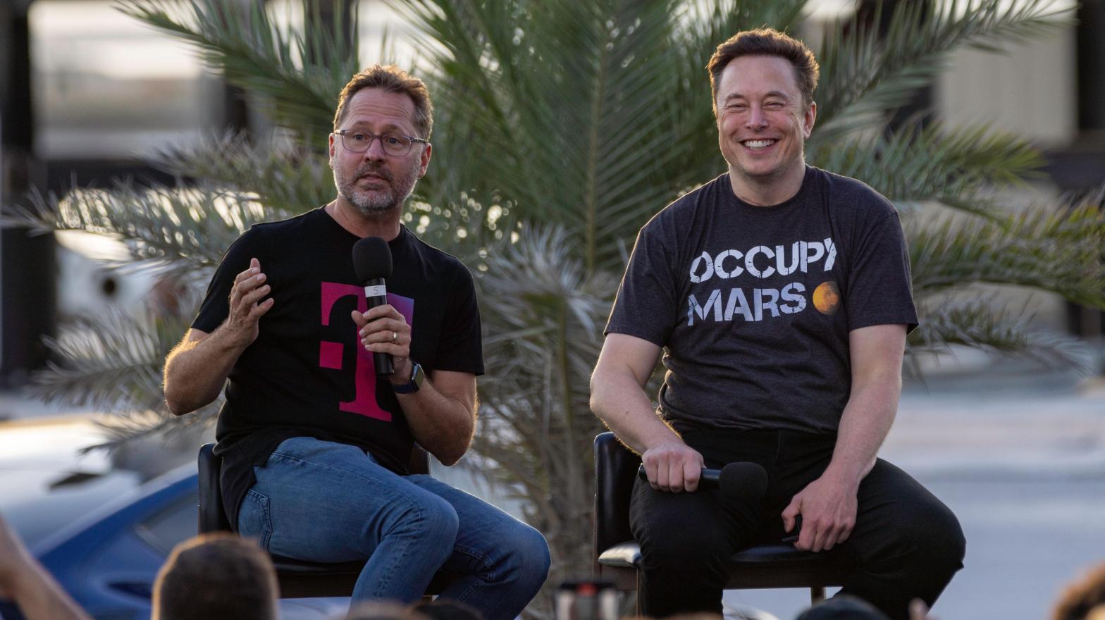 T-Mobile CEO Mike Sievert and SpaceX founder Elon Musk announcing their partnership earlier this year.  (Photo: Michael Gonzalez, Getty Images)