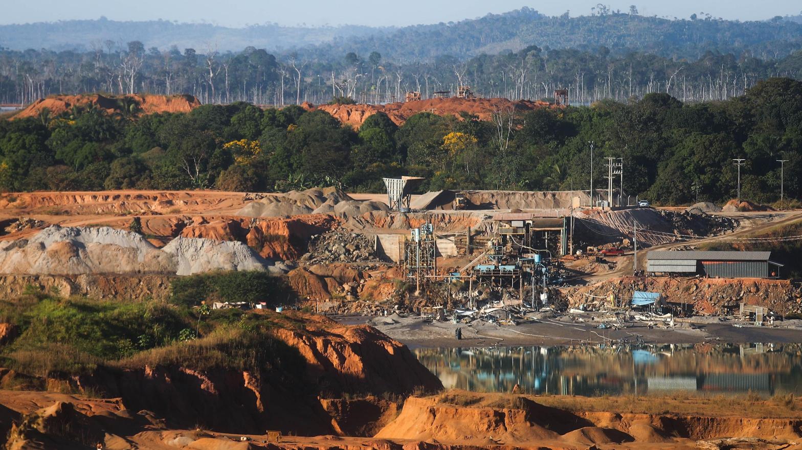 An open-air tin mine in the Brazilian Amazon. (Photo: Mario Tama, Getty Images)