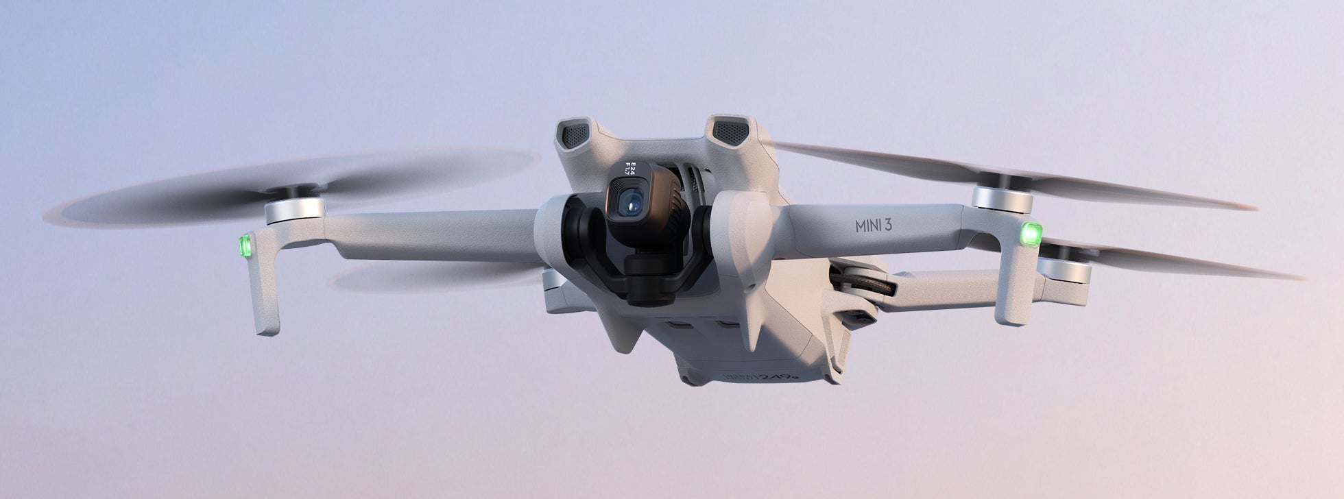 The new DJI Mini 3 features an added pair of support legs beneath the front propellers. (Image: DJI)