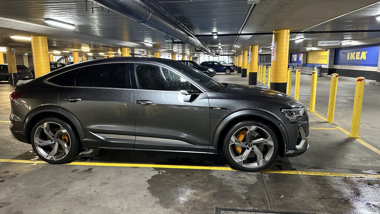 Audi e-tron S parked in a space with yellow lines