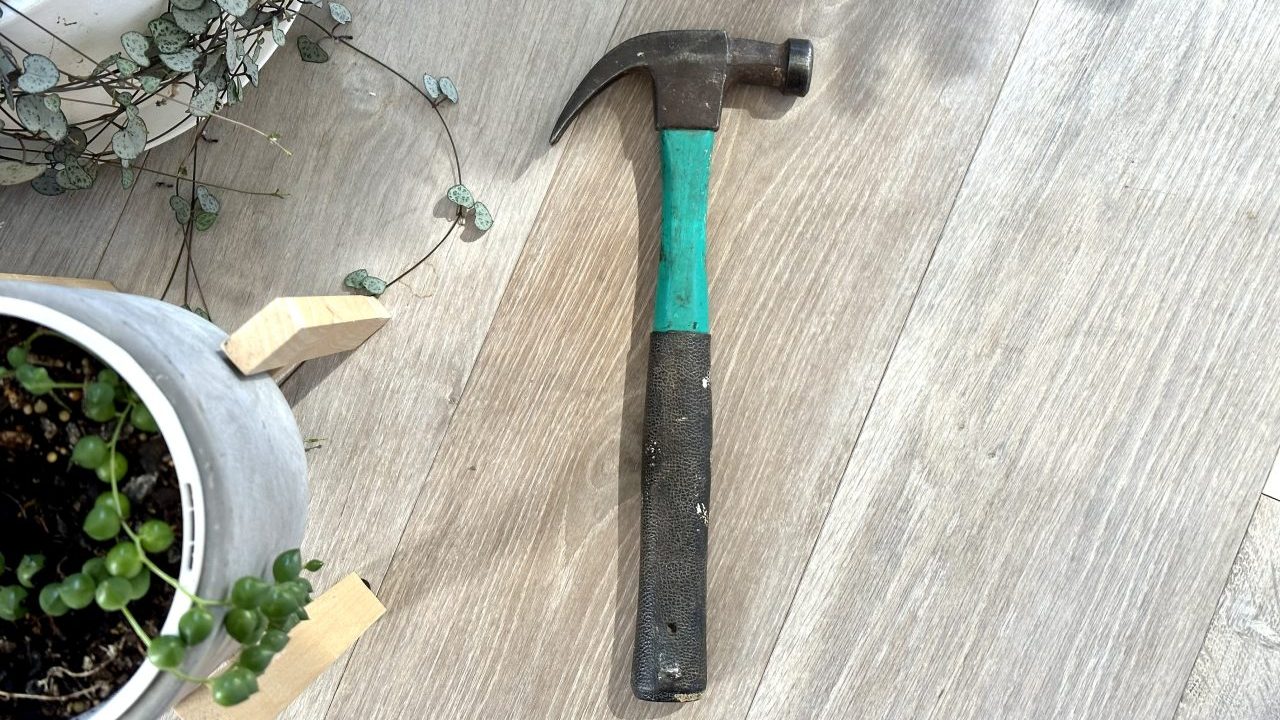 Hammer on a wooden floor