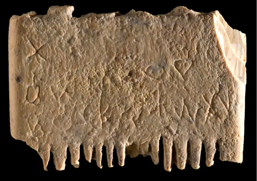 Canaanite lettering on an ancient ivory comb found in Israel. (Photo: Dafna Gazit, Israel Antiquities Authority)