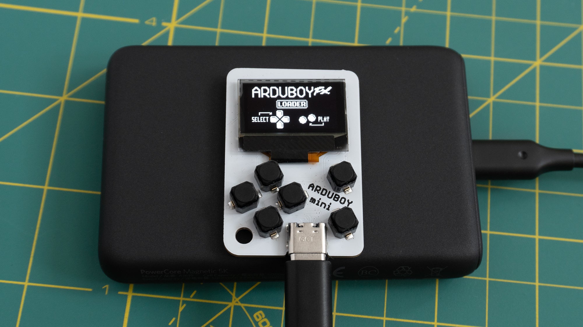 Out of the box you'll need to connect the Arduboy Mini to a power source with a USB-C cable. (Photo: Andrew Liszewski | Gizmodo)