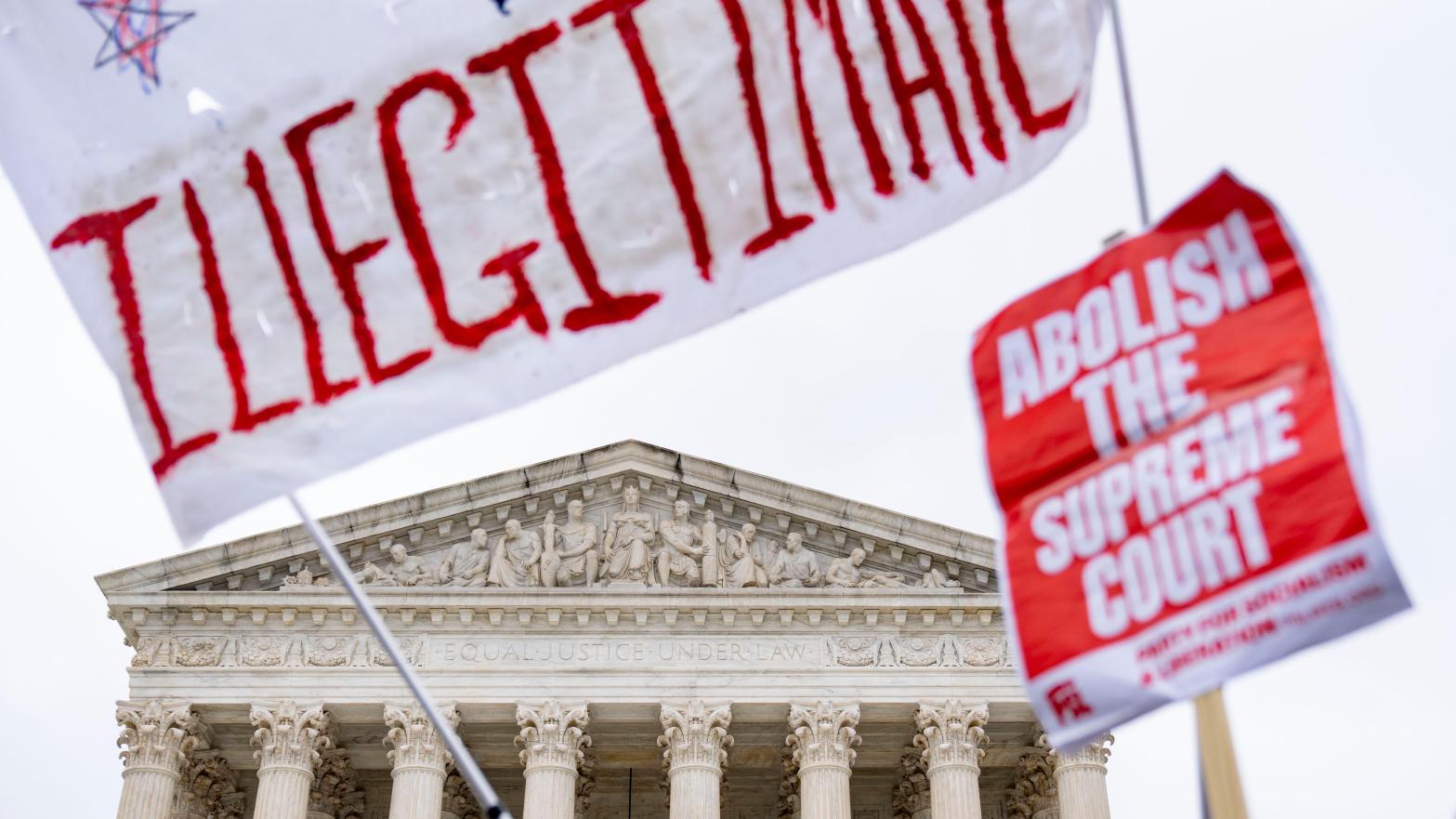 A protest in front of the Supreme Court in December. (Photo: Andrew Harnik, AP)