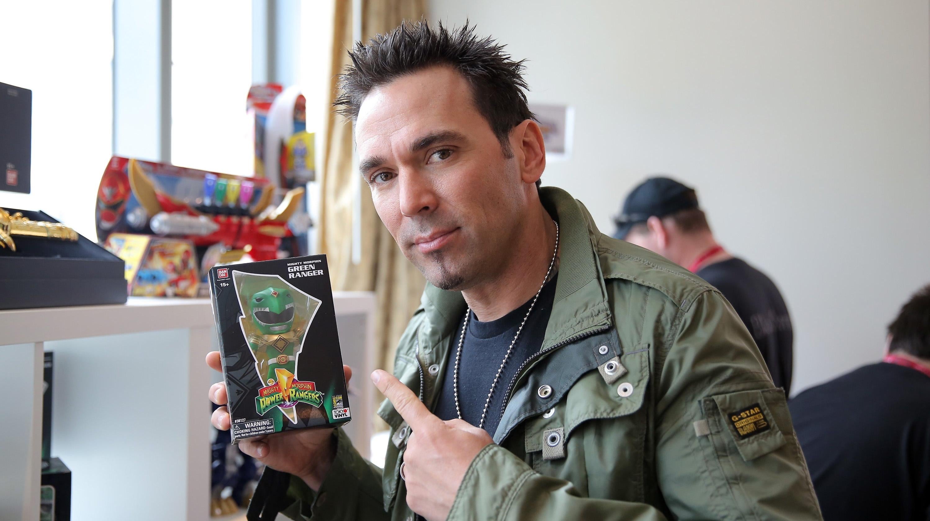 Jason David Frank checks out his Limited Edition Tokyo Vinyl Green Ranger at San Diego Comic-Con International on July 25, 2014 in San Diego, CA.  (Photo: Chelsea Lauren/Getty Images for Saban Brands, Getty Images)