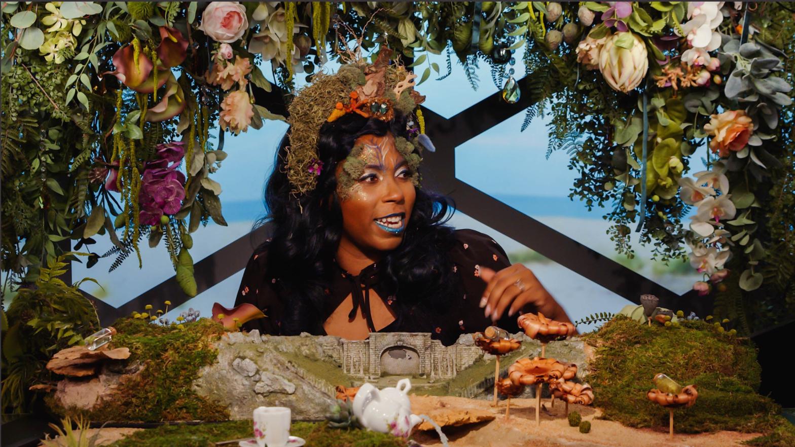 Aabria Iyengar as the Game Master of A Court of Fey and Flowers (Image: Dropout.tv)