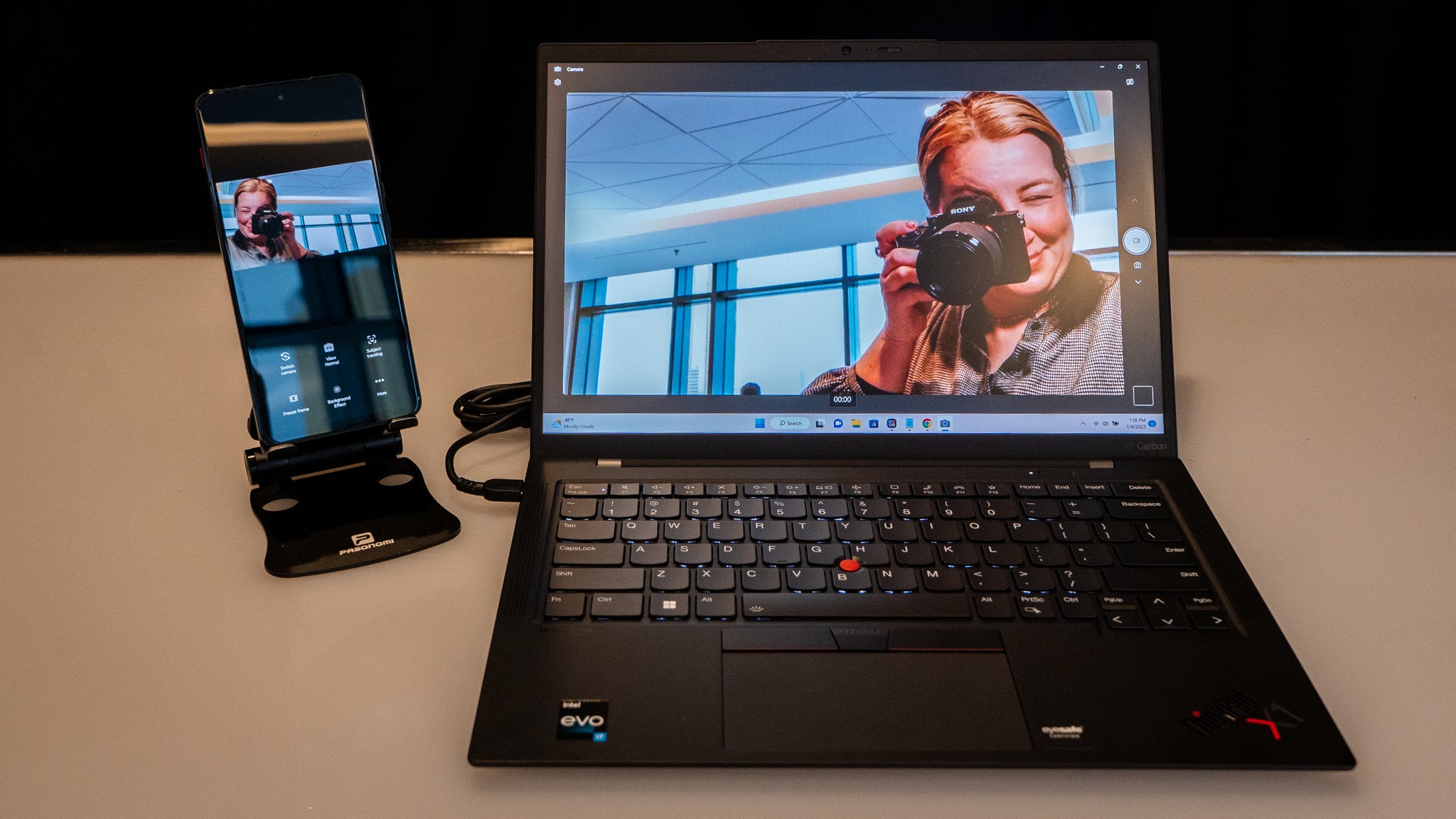 Use the Lenovo ThinkPhone as a webcam with a ThinkPad laptop.  (Photo: Florence Ion / Gizmodo)