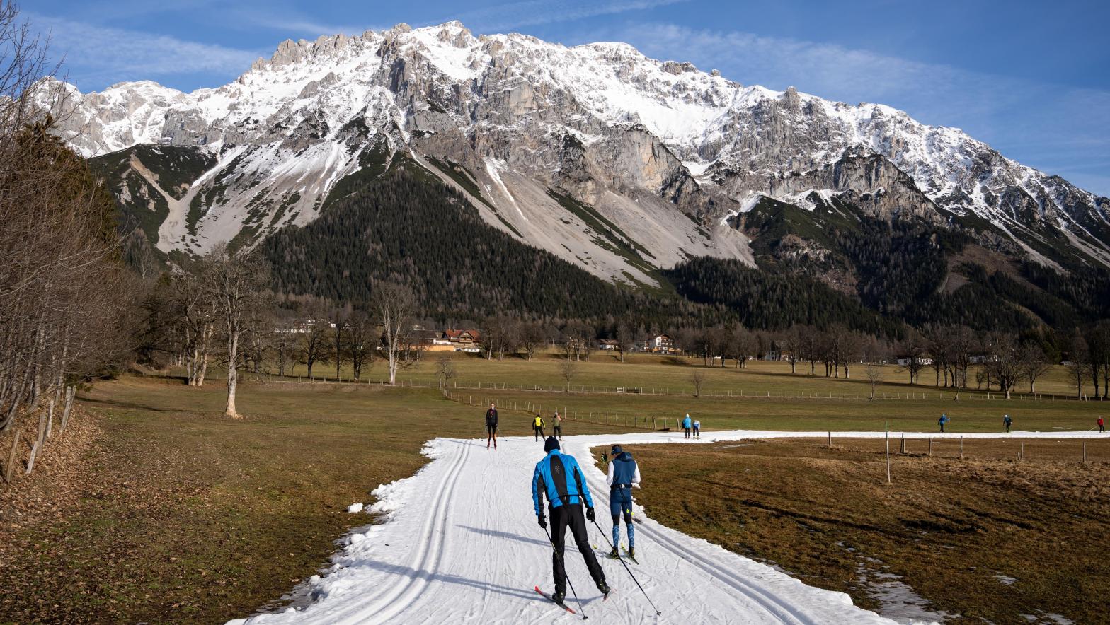 Cross-country skiiers on artificial snow in Ramsau am Dachstein, Austria.  (Photo: Daniel Kopatsch, Getty Images)