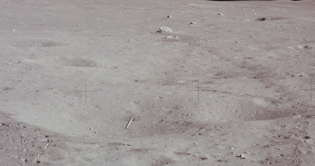 One of two golf balls left on the lunar surface can be seen just below the discarded javelin.  (Photo: NASA)