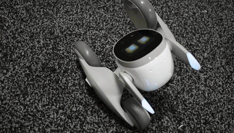 The KEYi Loona robot is extremely expressive, especially compared to other similar bots, many of them debuting at CES 2023. (Gif: Kyle Barr/Gizmodo)