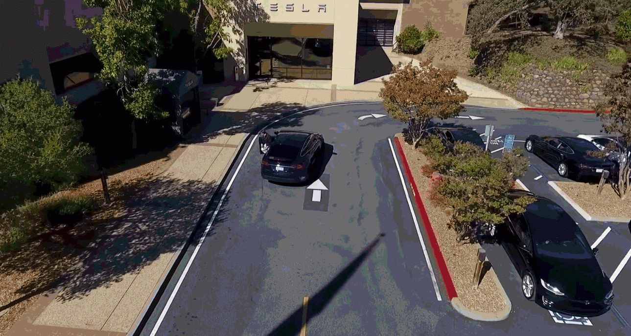 The video, released by Tesla in 2016, shows a Tesla dropping off its passenger before driving and parking on its own.  (Gif: Gizmodo/Tesla)